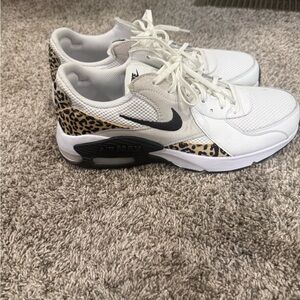 Nike Women's White and Black Sneakers with Leopard Accents